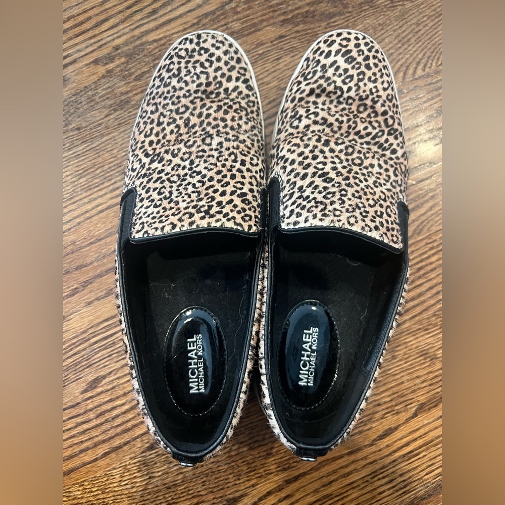 Michael Kors leopard slide on women’s shoes.